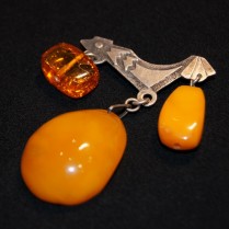 Vintage silver brooch with natural amber